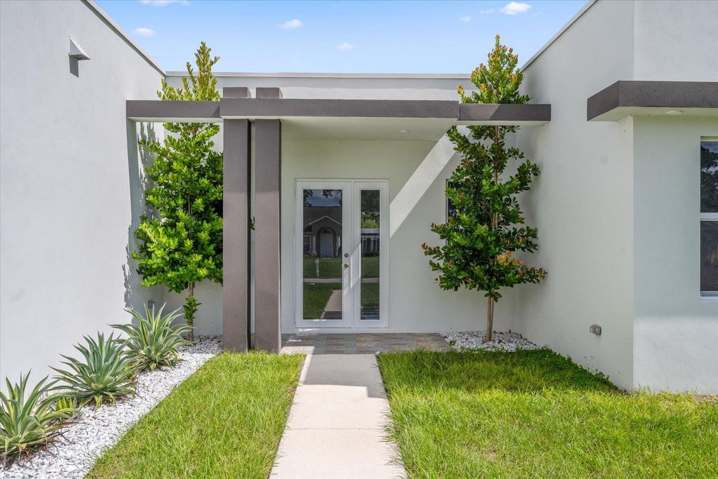 Photo of 2291 SW Plymouth Street, Port Saint Lucie, FL 34953 (MLS # R10929041)