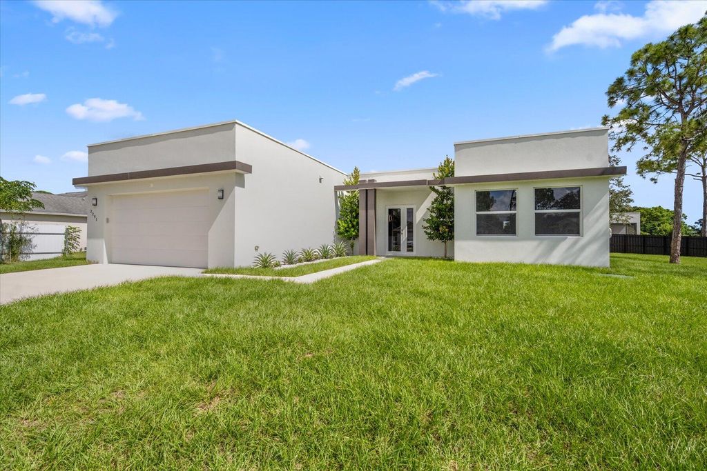 Photo of 2291 SW Plymouth Street, Port Saint Lucie, FL 34953 (MLS # R10929041)