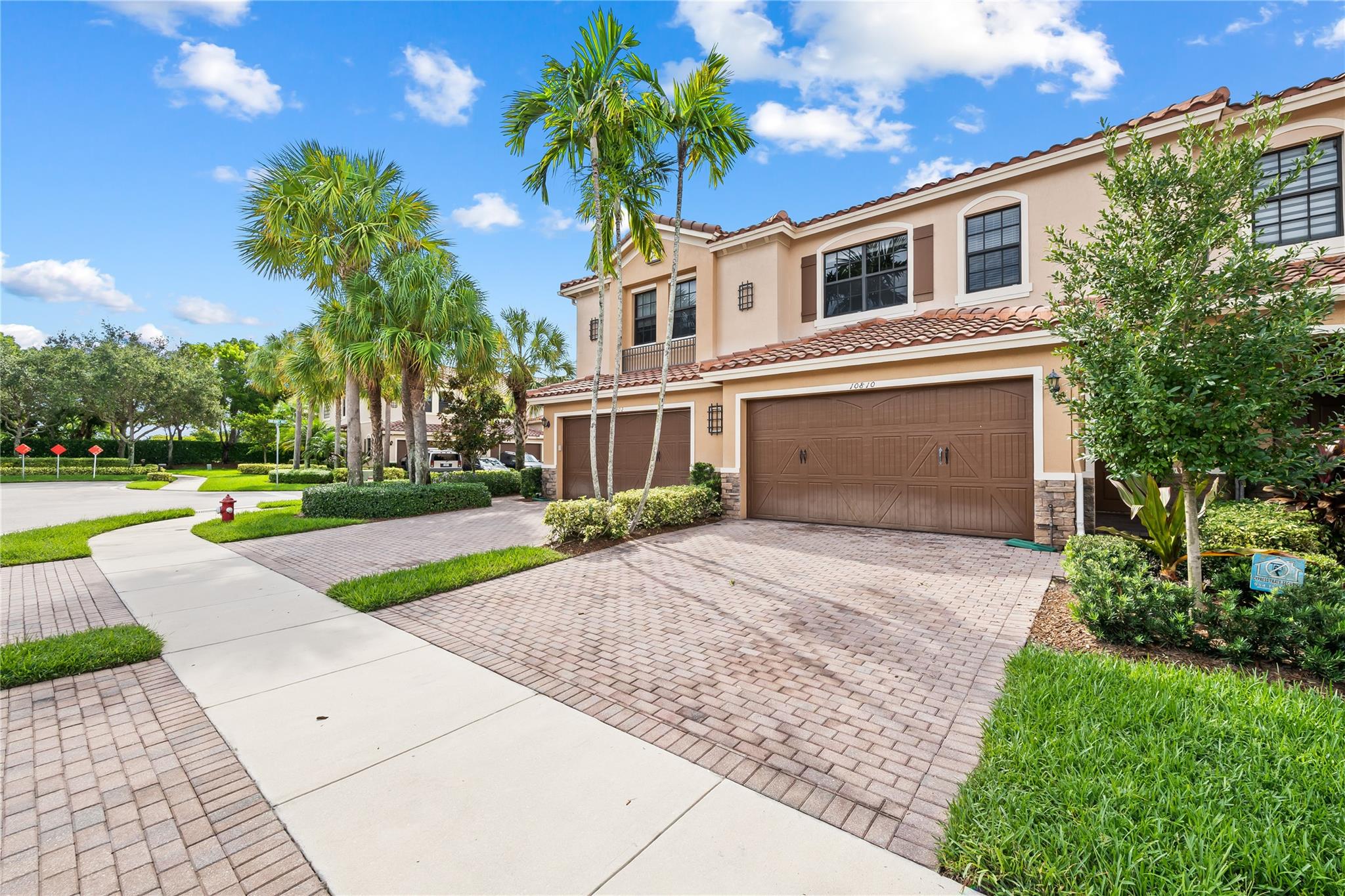 Luxury home in a prime Parkland location features 3 bedrooms, 2.5 baths, and an expanded primary suite with a sitting area. Upgrades include first-floor diagonal tile, upgraded granite counters, and dark wood cabinets in the kitchen. Stay secure with high-impact doors, windows, and an alarm system. Enjoy the outdoors from a relaxing screened-in porch. This residence offers a highly desirable lifestyle, perfectly situated within walking distance of top-rated Parkland schools, nature trails, parks, and the community center. Experience the best of what Parkland has to offer, all just steps from your front door.