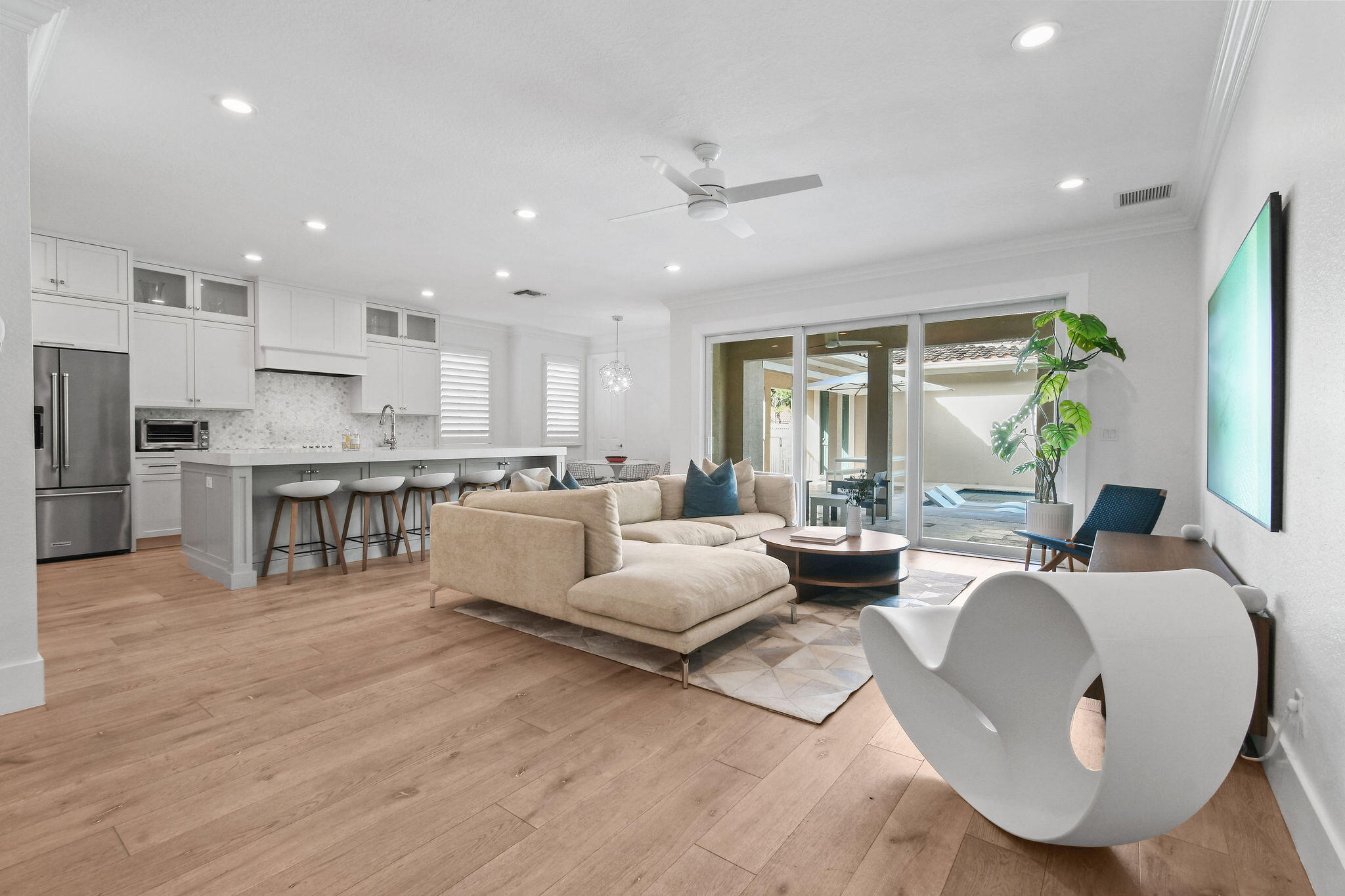 Incredible opportunity to lease this furnished, turn-key 4 Bedroom + Den, 3 Bath home in Canterbury Place at Abacoa. This meticulously maintained home features an updated kitchen with quartz island, beverage bar, pantry, hardwood floors, plantation shutters, automated shades, and hurricane impact windows/doors. Enjoy the oversized covered patio with travertine deck, private heated pool/spa with sunshelf, and lush landscaping. 2-car garage. HD cable/internet, landscaping, and pool maintenance included in rent. Conveniently located near the clubhouse with fitness center, pool, and preserve/lake trails. Zoned for top-rated schools. Minutes to Jupiter & Juno beaches, golf courses, dining and shopping. Flexible lease term.