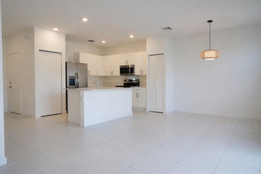 Photo of 11833 NW 47th Manor, Pompano Beach, FL 33076 (MLS # F10554938)