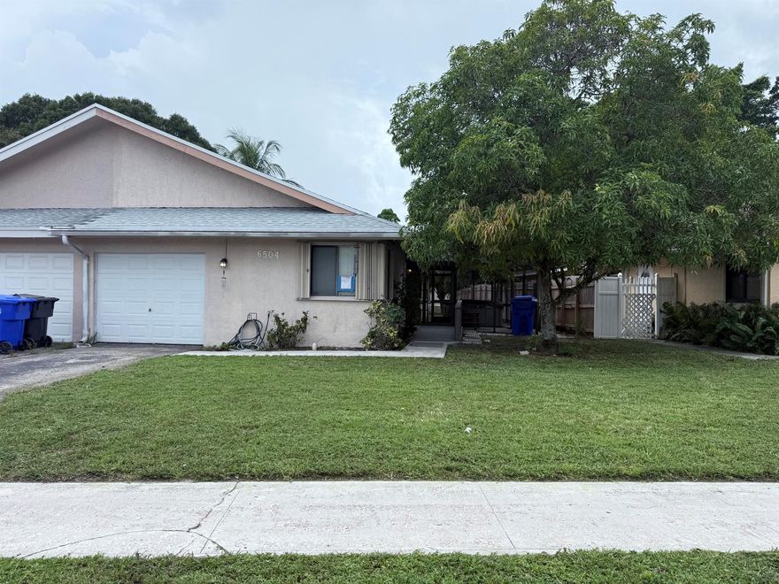 3/2 1 Car Garage Waterfront 1/2 Duplex home. With NO HOA.  The garage has been partially converted to an extra room but can be easily converted back.  Suitable for a man cave, 4th bedroom or office.  BRAND NEW ROOF installed August 2025. Close to everything and well maintained.  Accordion shutters on all windows with a hurricane impact front door.  Great home for a first-time buyer. Very private with its own backyard on the water.  This home is also handicap accessible with a front door ramp and a handicap accessible bathroom.  Can be removed if not needed.