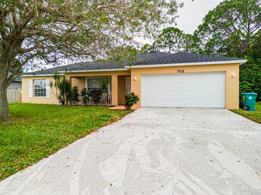 Photo of 702 NW Kilpatrick Avenue, Port Saint Lucie, FL 34983 (MLS # R10936684)