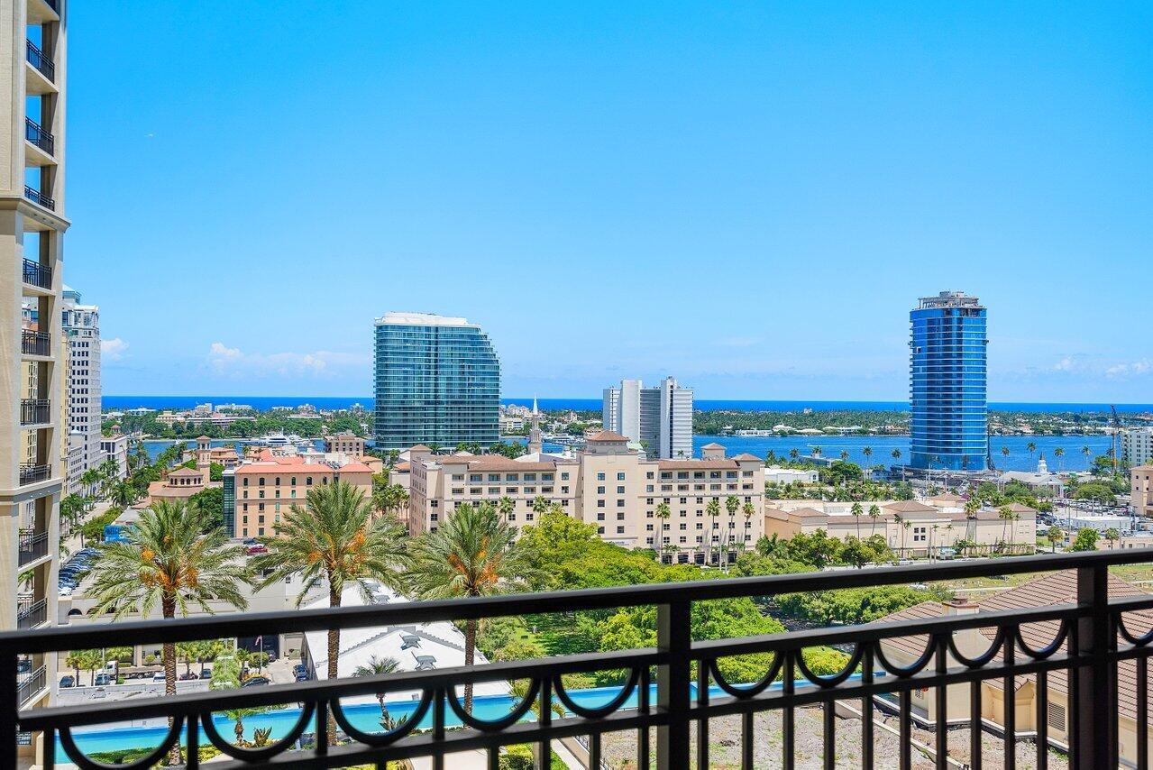 COMES WITH 2 PARKING SPOTS IN GARAGE & SEPARATE STORAGE UNIT!! Wake up to serene, sparking blue waters of the Intracoastal & Ocean! This luxurious, fully-furnished apartment features brand new, modern furniture & sprawling, panoramic views of the Resort-Style Pool Deck, Ocean, & Intracoastal! Perfectly situated in the heart of Downtown West Palm, this immaculate & move-in ready retreat offers everything you need to unwind and start living your best life. Beautiful built-in closets provide ample storage, and the brand new luxury vinyl plank flooring in the bedrooms adds a touch of elegance to the space. The 143-SqFt balcony with dreamy views let you breathe in the moment as you marvel at picturesque sunrises