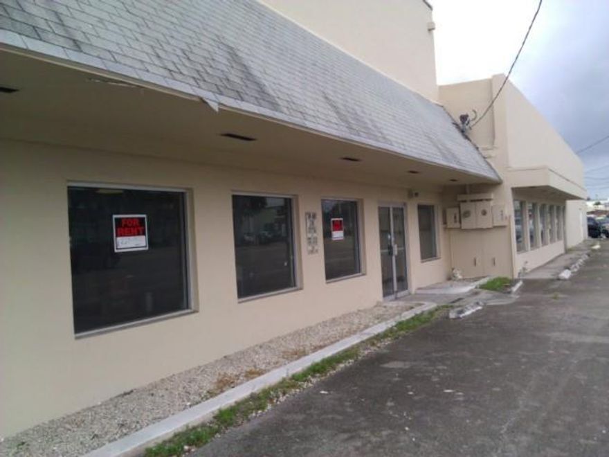 ~ Former Tanning Salon Suitable for a Variety of Retail Uses ~ Current Layout approx 2600sf & contains a minimum of (12) Twelve Offices/Suites/Rooms(?) or can be Opened up and Reconfigured ~ Cool Exposed Ceilings & Combo Terrazzo & Stained Concrete Floors ~ Tremendous Visibility along Busy Dixie directly across from Publix ~ 400+amp power if needed ~ Rear Overhead door can be restored ~ Laundry ~ Good Potential with a lot of Infrastructure in Place ~ Flexible Parking ~