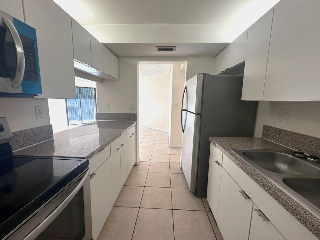 Photo of 1850 N Congress Avenue #208, West Palm Beach, FL 33401 (MLS # F10468261)