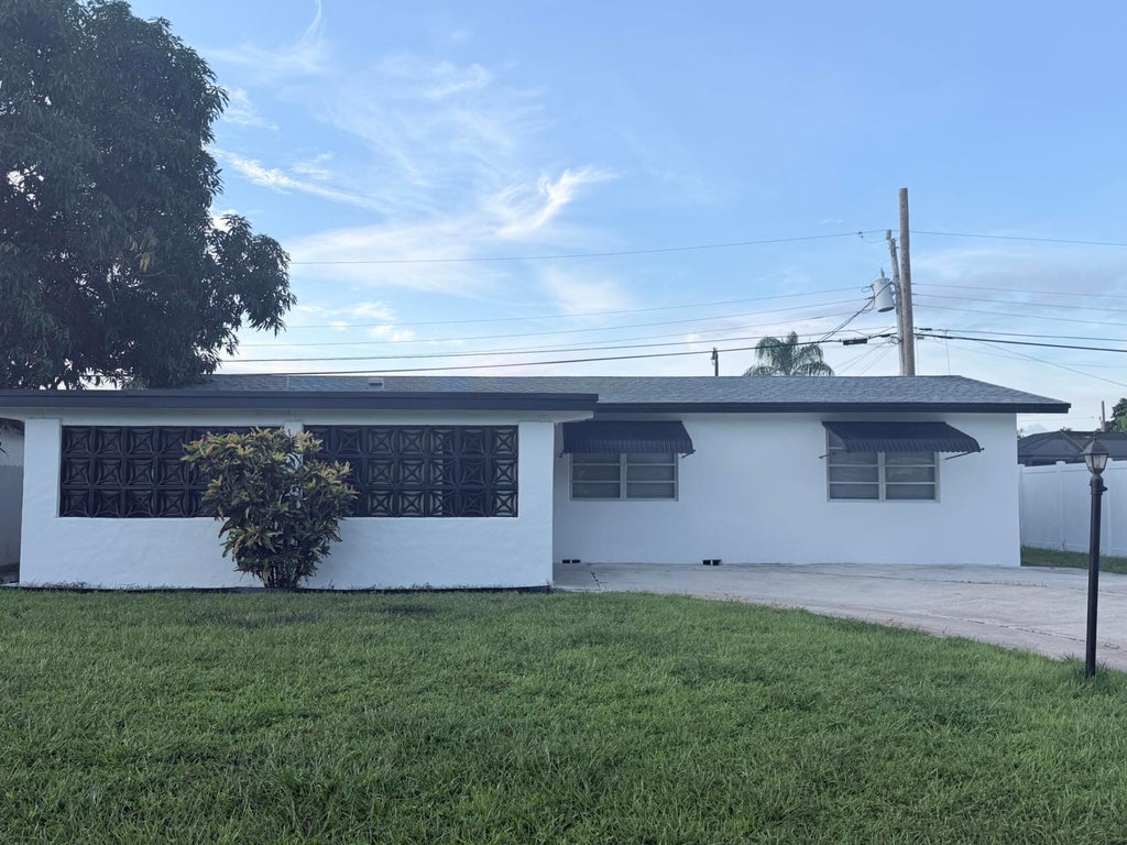 Photo of 1624 NE 31ST Court, Pompano Beach, FL 33064 (MLS # B26081708)