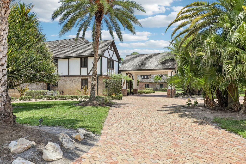 Photo of 14900 Stirrup Lane, Wellington, FL 33414 (MLS # B26033462)