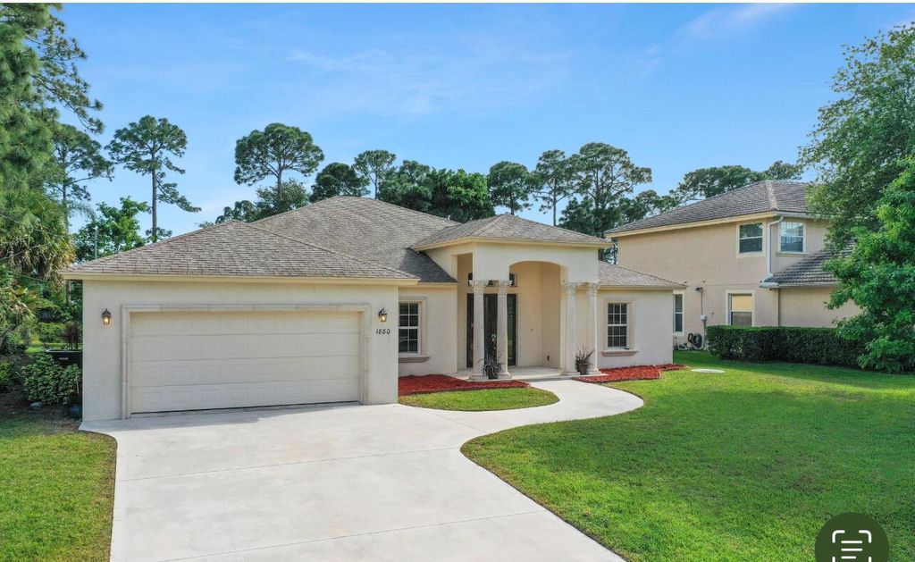 Photo of 1880 SW Millikin Avenue, Port Saint Lucie, FL 34953 (MLS # R10970504)
