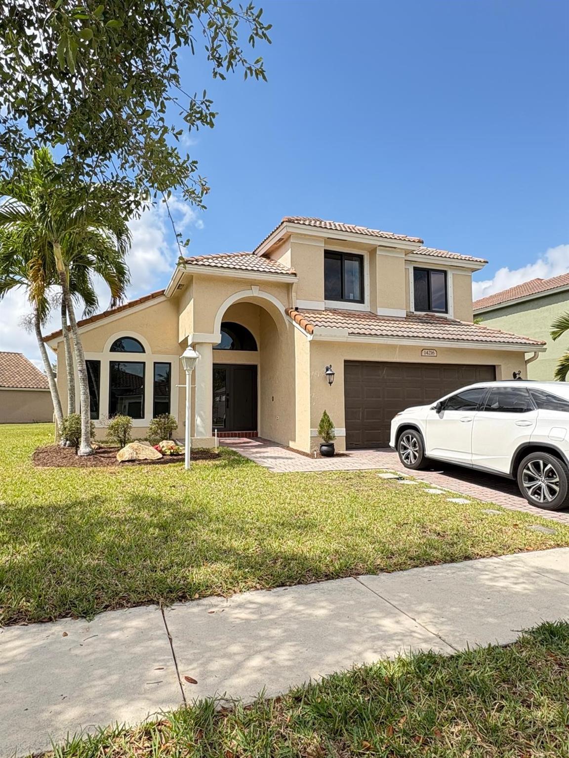 STUNNING LAKEFRONT MALIBU MODEL in desirable Pembroke Falls! This impeccably renovated 4-bedroom, 2.5-bathroom home is a true must-see! Located on Oversized Corner lot, it boasts luxurious finishes and modern design elements throughout. Features include high-impact windows and doors, beautiful new tile flooring in first floor, wood in the second floor. Modern gourmet kitchen with quartz countertops, stainless steel appliances, and a spacious central island. The open-concept floor plan is perfect for entertaining, with a spacious 1st-floor master suite featuring a large walk-in closet. The resort-style Pembroke Falls clubhouse, including a heated pool, spa, fitness center, tennis/pickleball courts, basketball court, and a grand ballroom.