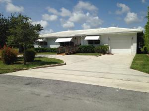 50 Foot Boat Dock Space, This magnificent 2,232 sq. ft. 3b, 2bth, 1 car garage Waterfront Masterpiece, with a custom built patio, and private dock, sits on an oversized lot granting a panoramic view of the intercostal. Also, the extended driveway allows for additional parking on special family events. Surrounding the home, upgraded landscaping invites a natural breeze while maintaining privacy. Furthermore, spacious dinning & living areas, and excellent lighting throughout, in a prestigious community close to EAU Palm Beach Resort, restaurants, shops, and conveniently accessible from Interstate 95.
