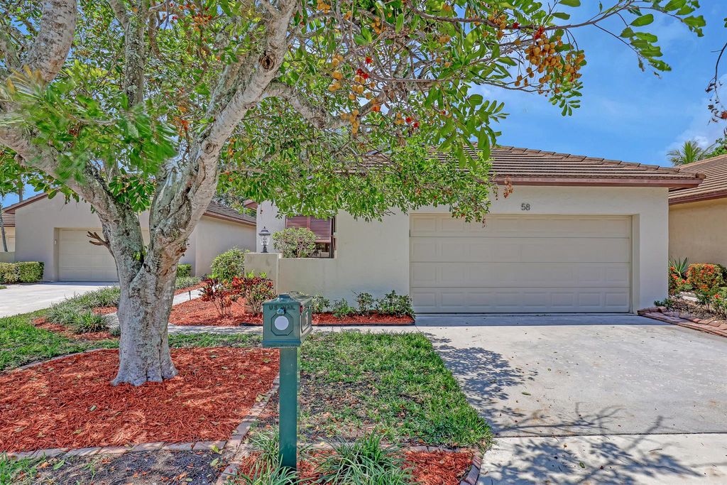 Photo of 58 Ironwood Way N, Palm Beach Gardens, FL 33418 (MLS # R10897840)