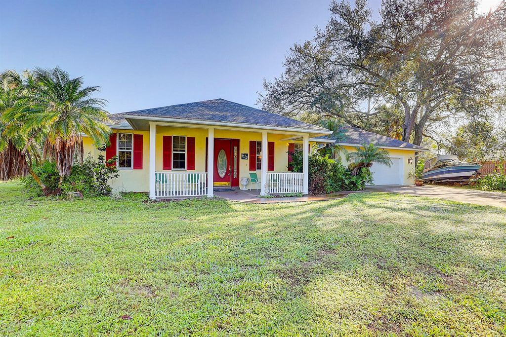 Photo of 1707 SW Leafy Road, Port Saint Lucie, FL 34953 (MLS # R10840901)