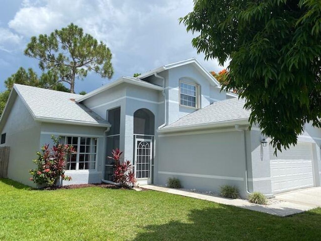 Photo of 145 Heatherwood Drive, Royal Palm Beach, FL 33411 (MLS # R10745358)