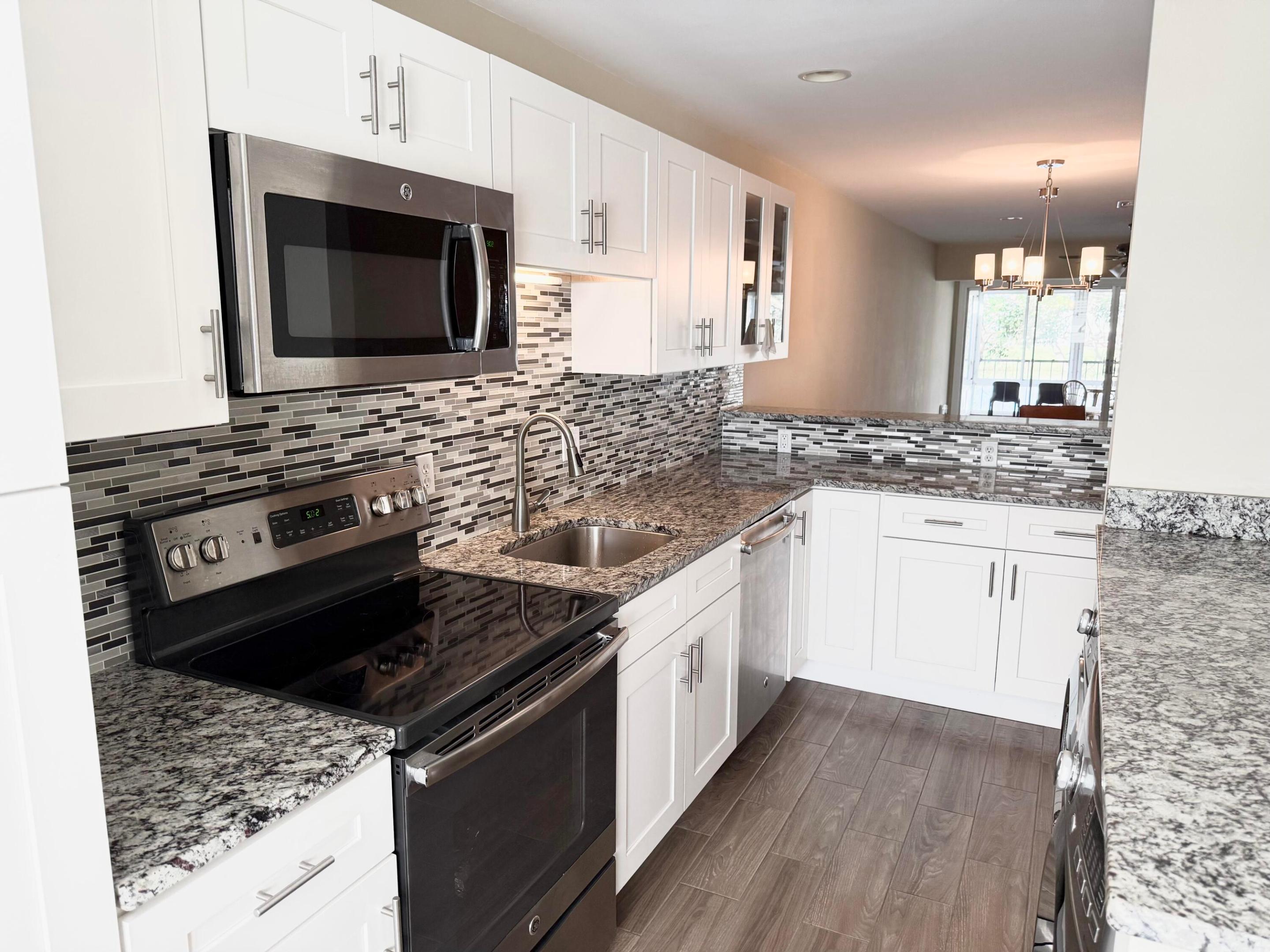 PINES OF DELRAY CONDO ONE,TWO AND THREE - Residential