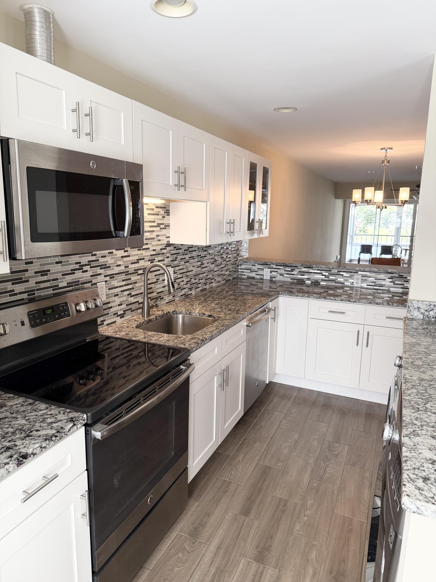 PINES OF DELRAY CONDO ONE,TWO AND THREE - Residential