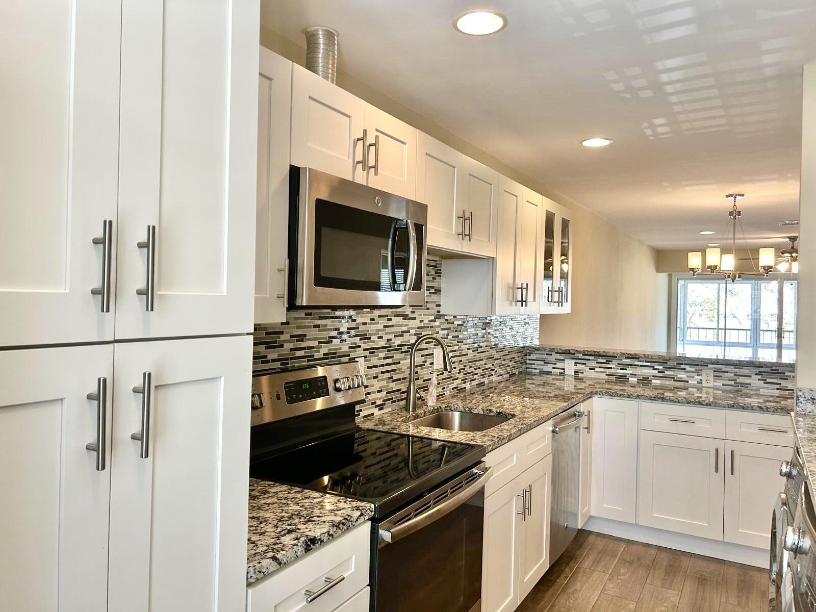 PINES OF DELRAY CONDO ONE,TWO AND THREE - Residential