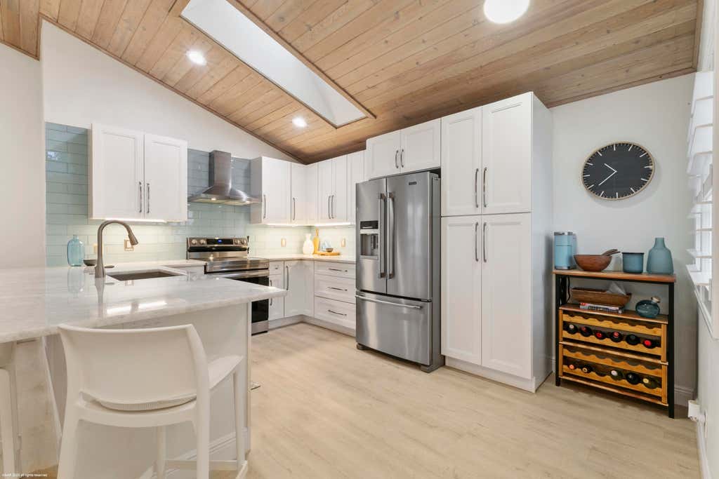 Photo of 59 Dorchester Circle, Palm Beach Gardens, FL 33418 (MLS # R10947339)
