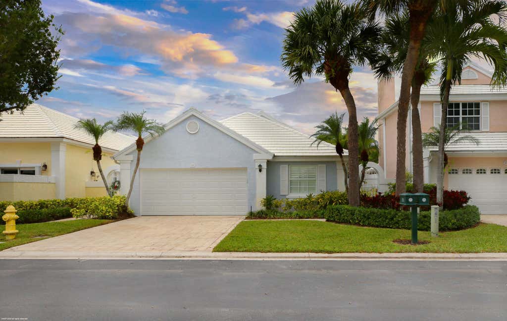 Photo of 59 Dorchester Circle, Palm Beach Gardens, FL 33418 (MLS # R10947339)