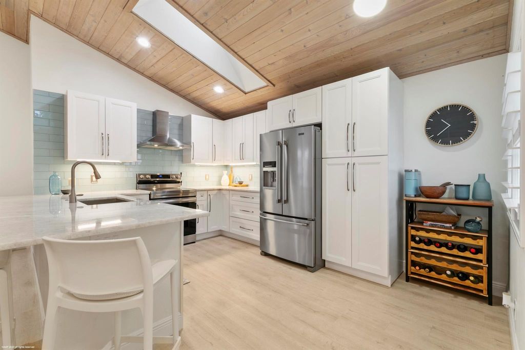 Photo of 59 Dorchester Circle, Palm Beach Gardens, FL 33418 (MLS # R10947339)