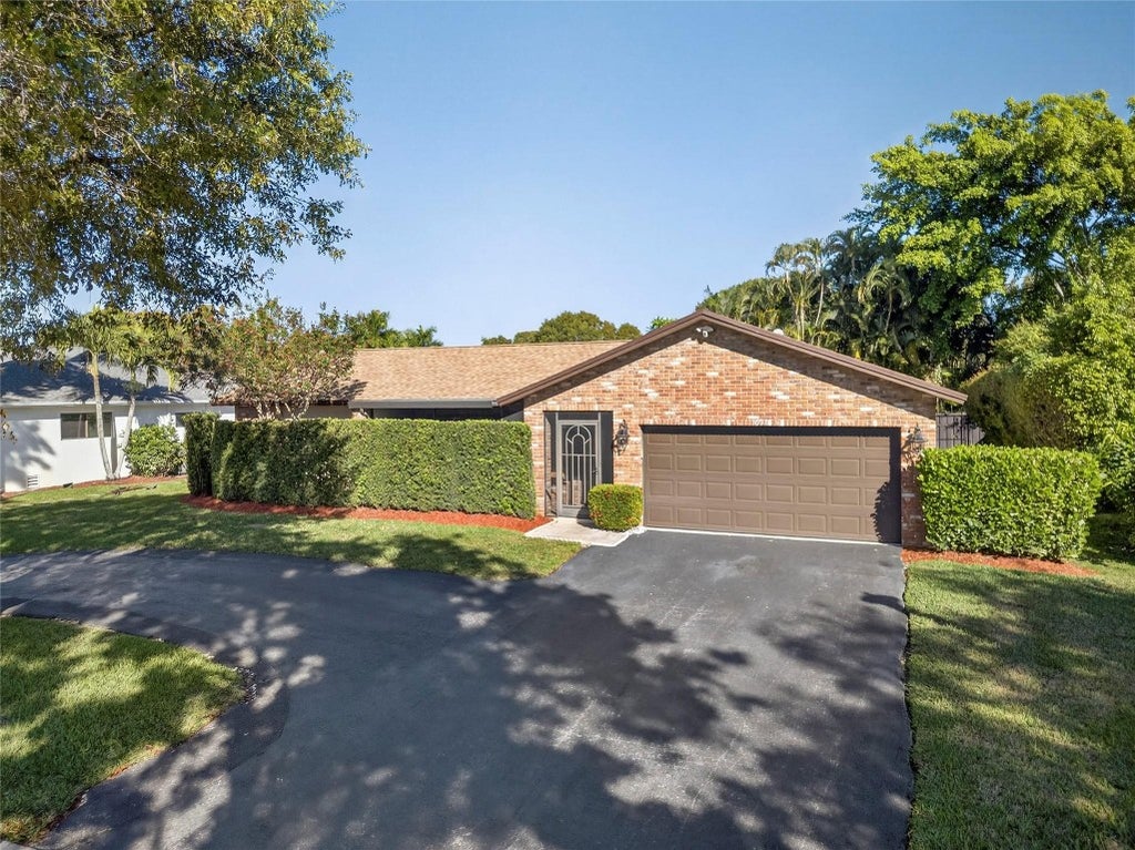 Photo of 10975 NW 20th Drive, Coral Springs, FL 33071 (MLS # F10546239)