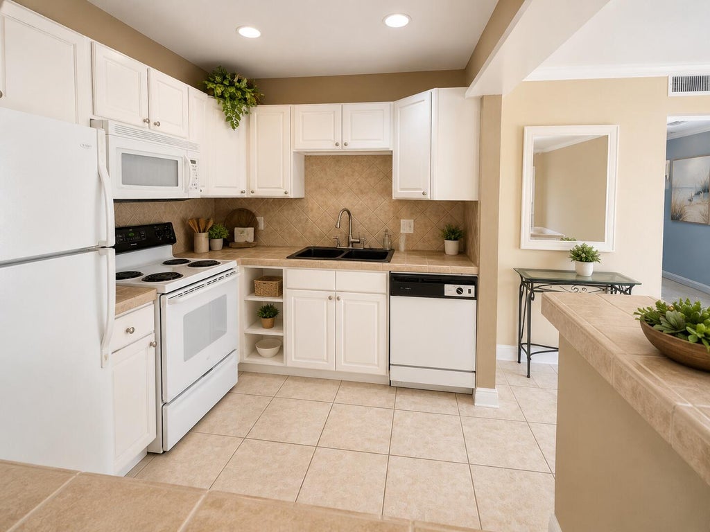 Photo of 322 Seville Trail N #N, Delray Beach, FL 33446 (MLS # B26045521)
