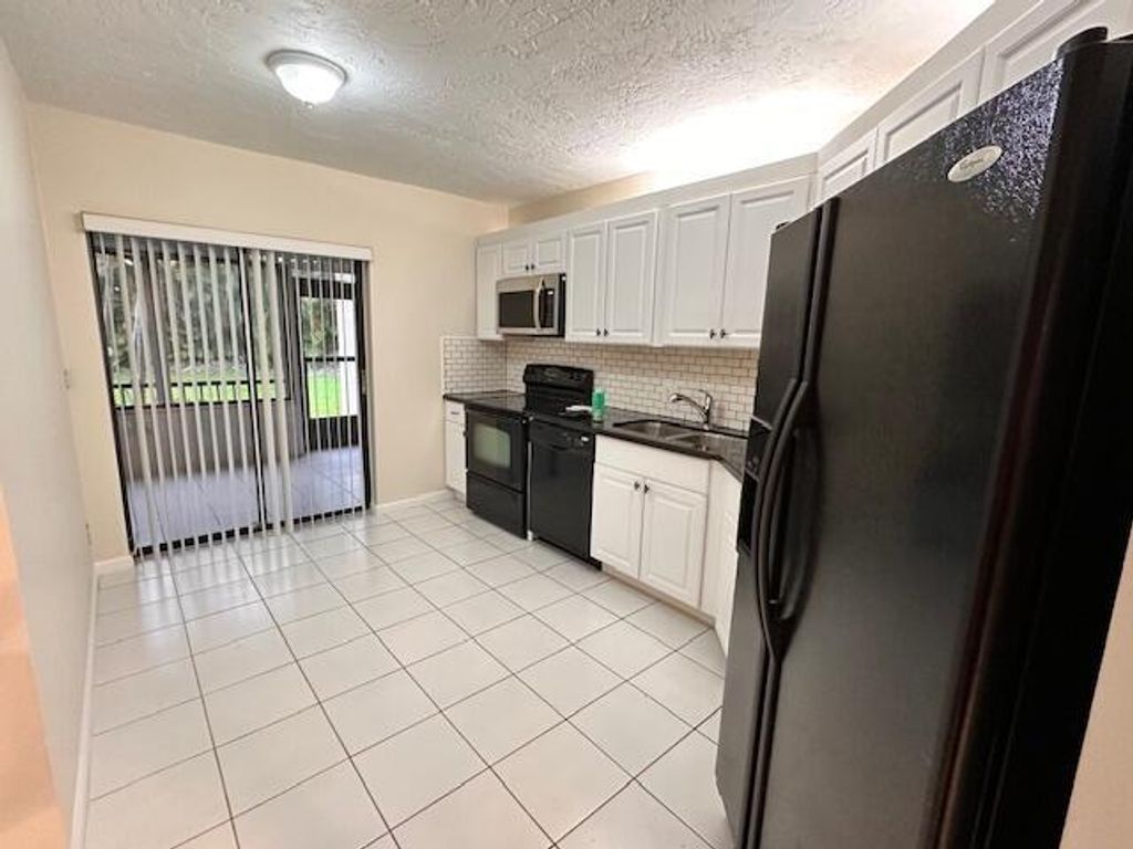 Photo of 7519 La Paz Boulevard #102, Boca Raton, FL 33433 (MLS # R11090466)