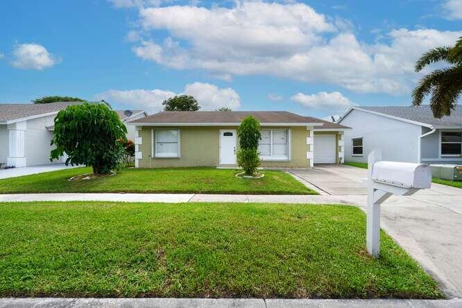 This beautifully maintained 4br, 2ba home offers comfort, space, and convenience all in one. From the moment you arrive, you'll appreciate the charming curb appeal. In the backyard you'll find lush fruit-bearing trees like mango, avocado, and soursop. Inside, you'll find a well-kept interior with a spacious layout, updated AC, and accordion shutters for peace of mind. The inviting kitchen and living areas are perfect for both relaxing and entertaining.With no back neighbors and located in a quiet, friendly community with a low monthly HOA, this home is also just minutes from major access roads, popular shops, and restaurants. Everything you need is within easy reach.Don't miss this incredible opportunity to own a lovingly cared for home in a prime location! Schedule your showing today!