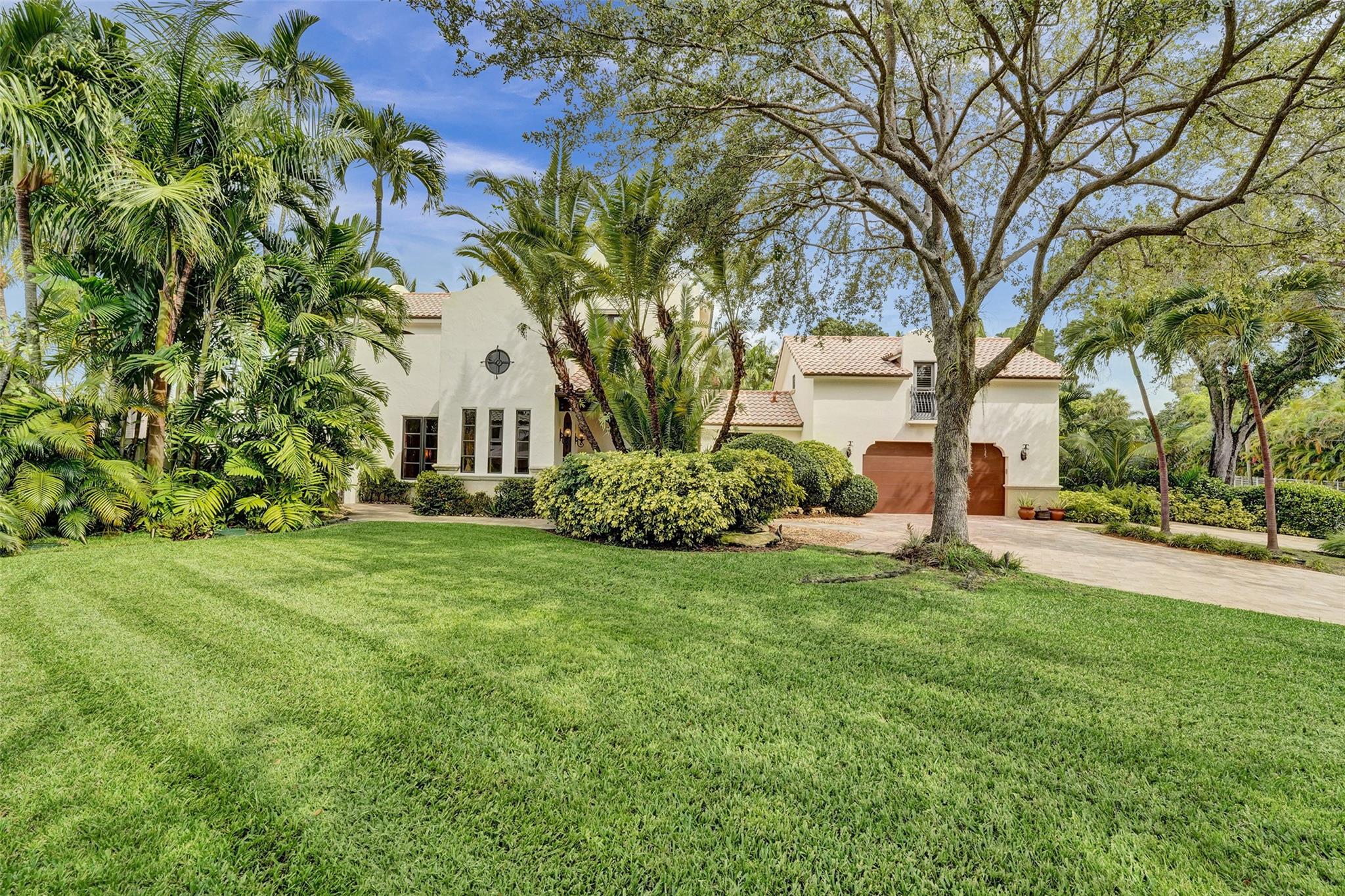 EXQUISITE CUSTOM BUILT WATERFRONT ESTATE - SITUATED ON 122FT OF PROTECTED WATER FRONTAGE, ON A WIDE CANAL & NO FIXED BRIDGES. PERFECT FOR SOMEONE LOOKING TO HOME THEIR 100FT YACHT! THE HOME WAS CUSTOM BUILT FROM THE GROUND UP IN 2007! HIGH END FINISHES & METICULOUSLY CHOSEN EXOTIC WOODS & STONE THROUGHOUT! DESIGNED FOR THOSE WHO LOVE TO ENTERTAIN & ENJOY THE LUXURY OF LIVING ON A PRIVATE RESORT! 3 ENSUITE LIVING QUARTERS – EACH W/PRIVATE SITTING AREAS. A GOURMET KITCHEN W/DOUBLE ISLAND, PROFESSIONAL BUILT IN APPLIANCES & GAS COOKTOP! LIVING & DINING AREAS OVERLOOKING THE POOL AREA! LUSH TROPICALLY LANDSCAPED GROUNDS SURROUND BY THE HEATED POOL & COVERED LANAI! A CABANA W/BUILT IN GRILL & CABANA BATH! AN OVERSIZED 2 CAR GARAGE, WHOLE HOME GENERATOR & MUCH MORE! TRULY A MUST SEE!