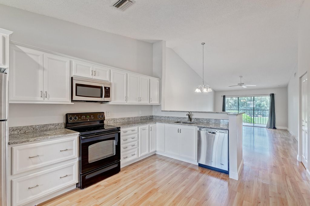 Photo of 1122 Keystone Drive N #D, Jupiter, FL 33458 (MLS # R10936203)