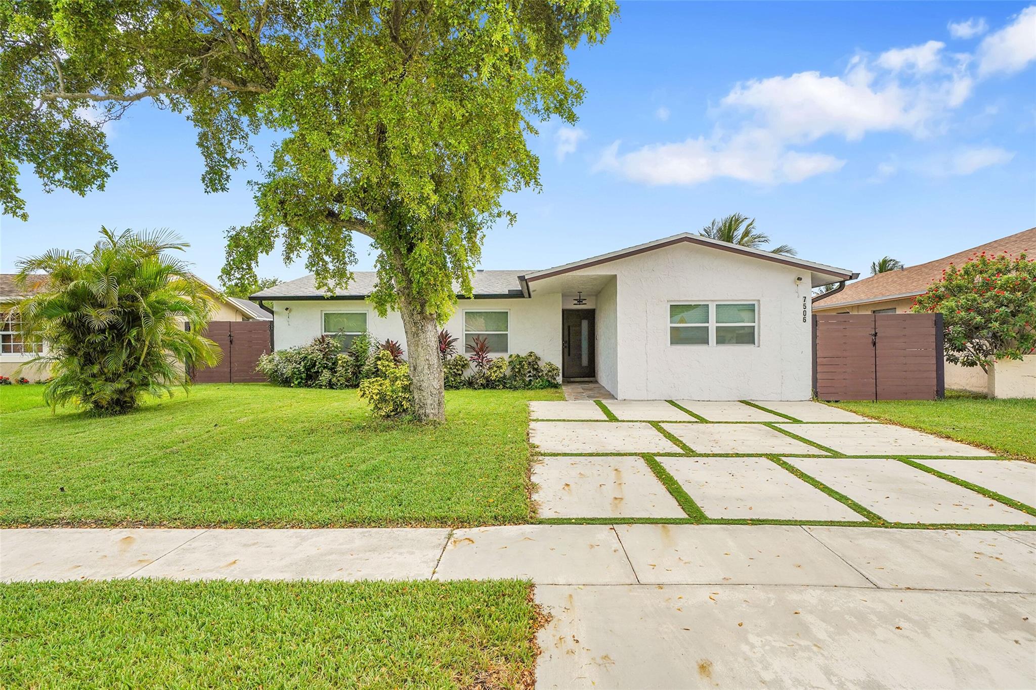Beautifully renovated 3-bedroom, 2-bathroom single-family home in desirable North Lauderdale. Offered fully furnished and move-in ready. Inside, you’ll find an open and airy layout with contemporary finishes throughout. The kitchen and living spaces have been thoughtfully updated, and both bathrooms feature modern fixtures and design.
Enjoy the ease of keyless entry, a full-size washer and dryer, and stunning modern pavers that enhance the curb appeal. The outdoor spaces are designed for both relaxation and entertainment, with a stylish look that matches the home’s modern interior.