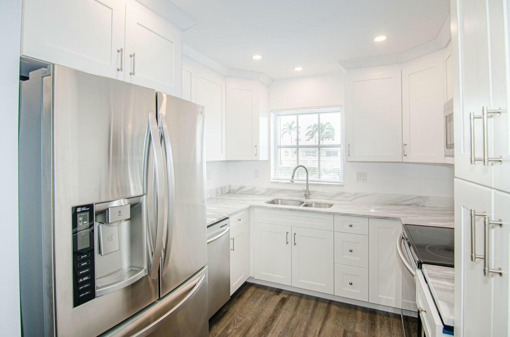 Photo of 2630 Emory Drive E #E, West Palm Beach, FL 33415 (MLS # B26025820)