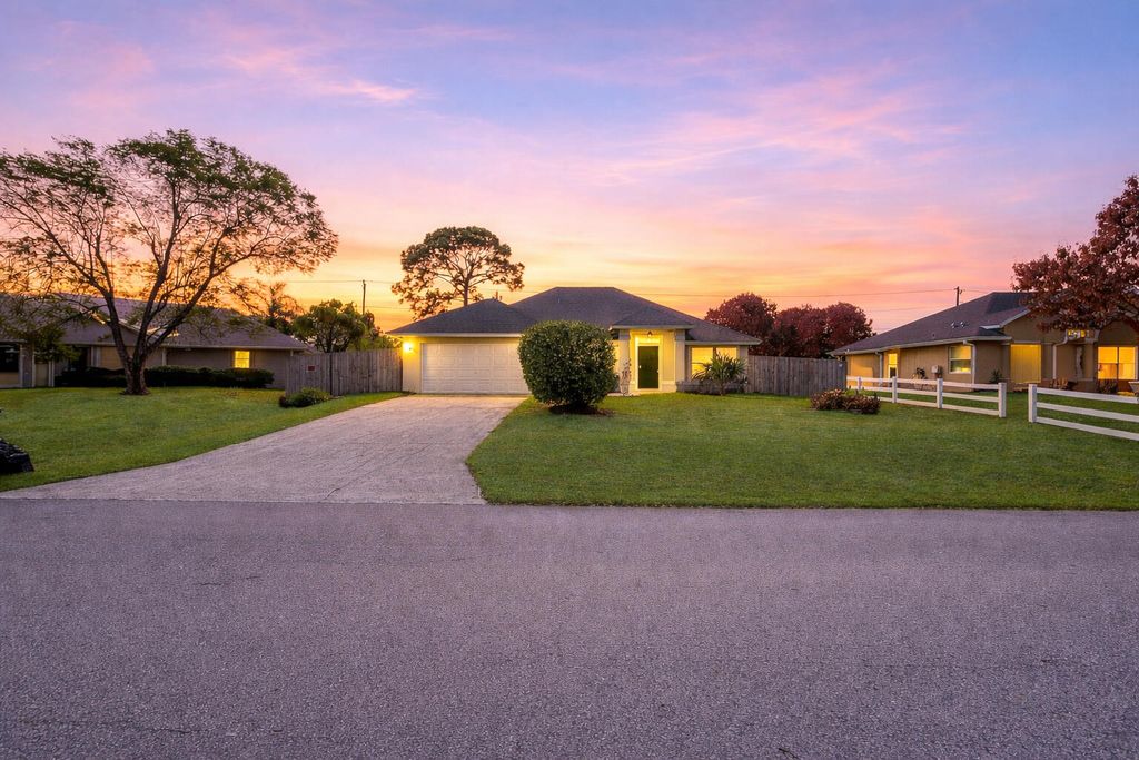 Photo of 1526 SW Dycus Avenue, Port Saint Lucie, FL 34953 (MLS # B26006401)