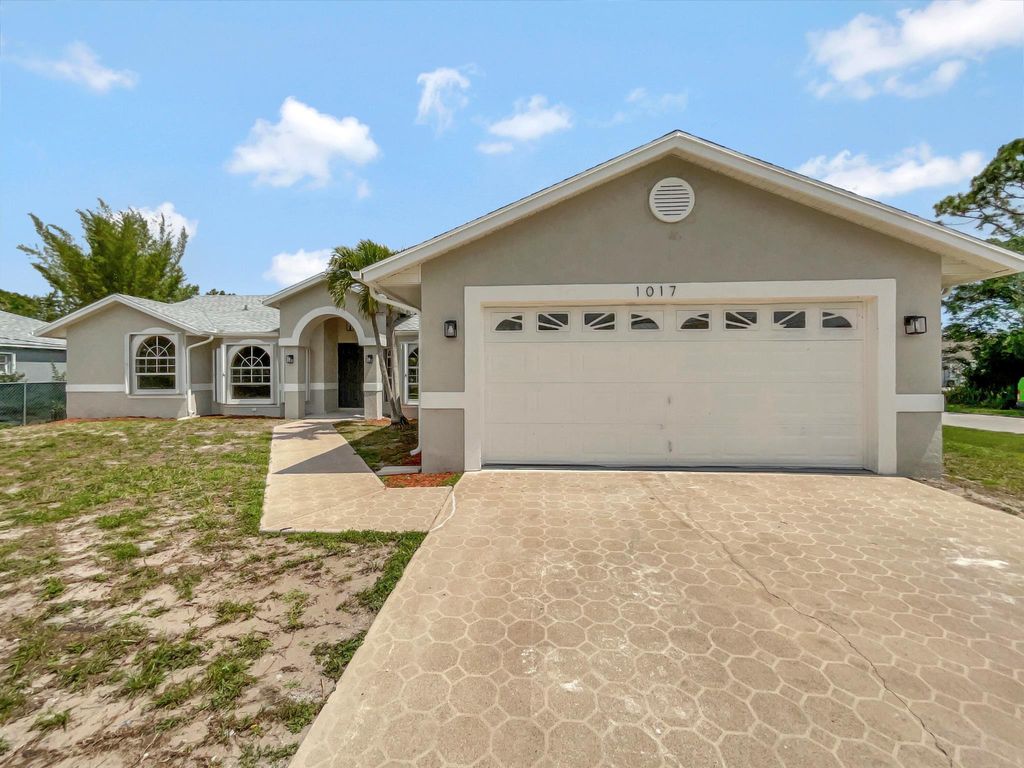 Photo of 1017 SW Sultan Drive, Port St Lucie, FL 34953 (MLS # R10884821)