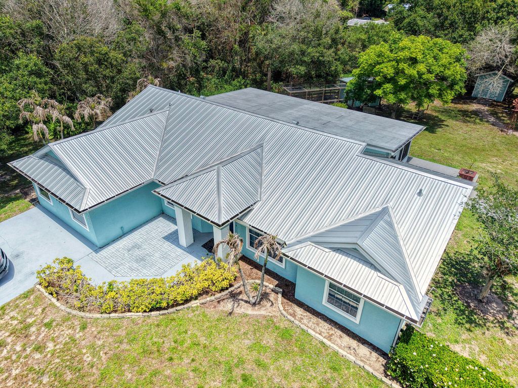 Photo of 5700 Oleander Avenue, Fort Pierce, FL 34982 (MLS # B26025644)