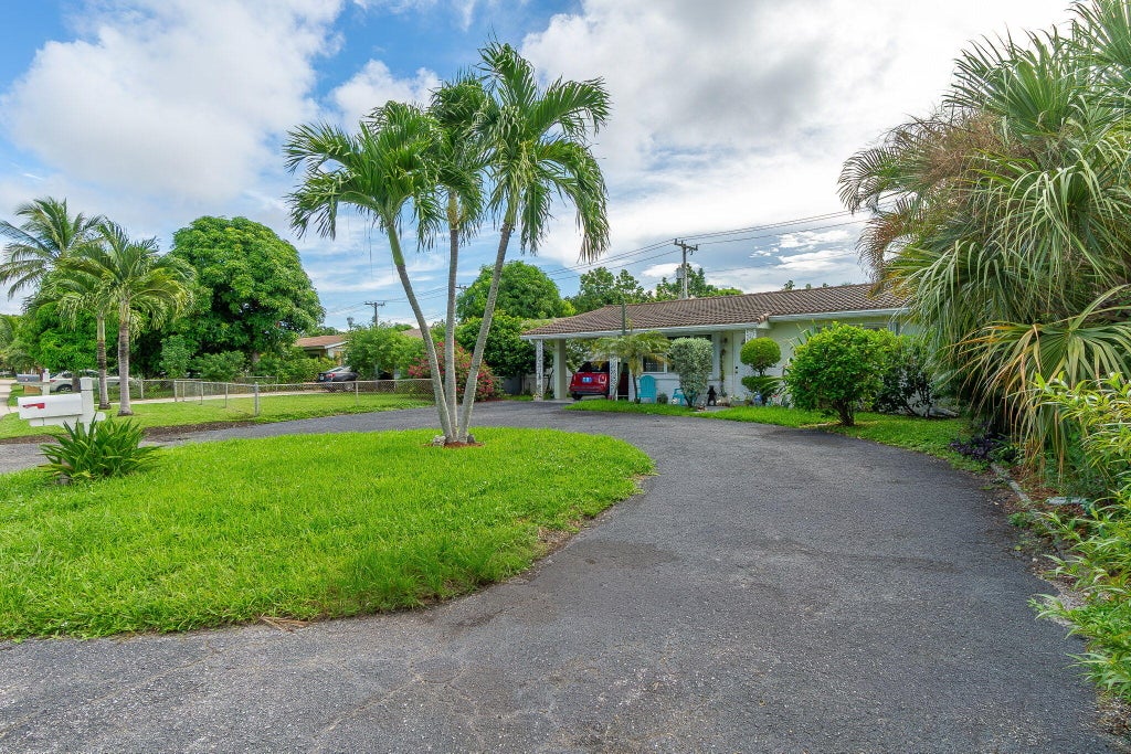 Photo of 1318 CARDINAL Lane, Lantana, FL 33462 (MLS # B26075987)