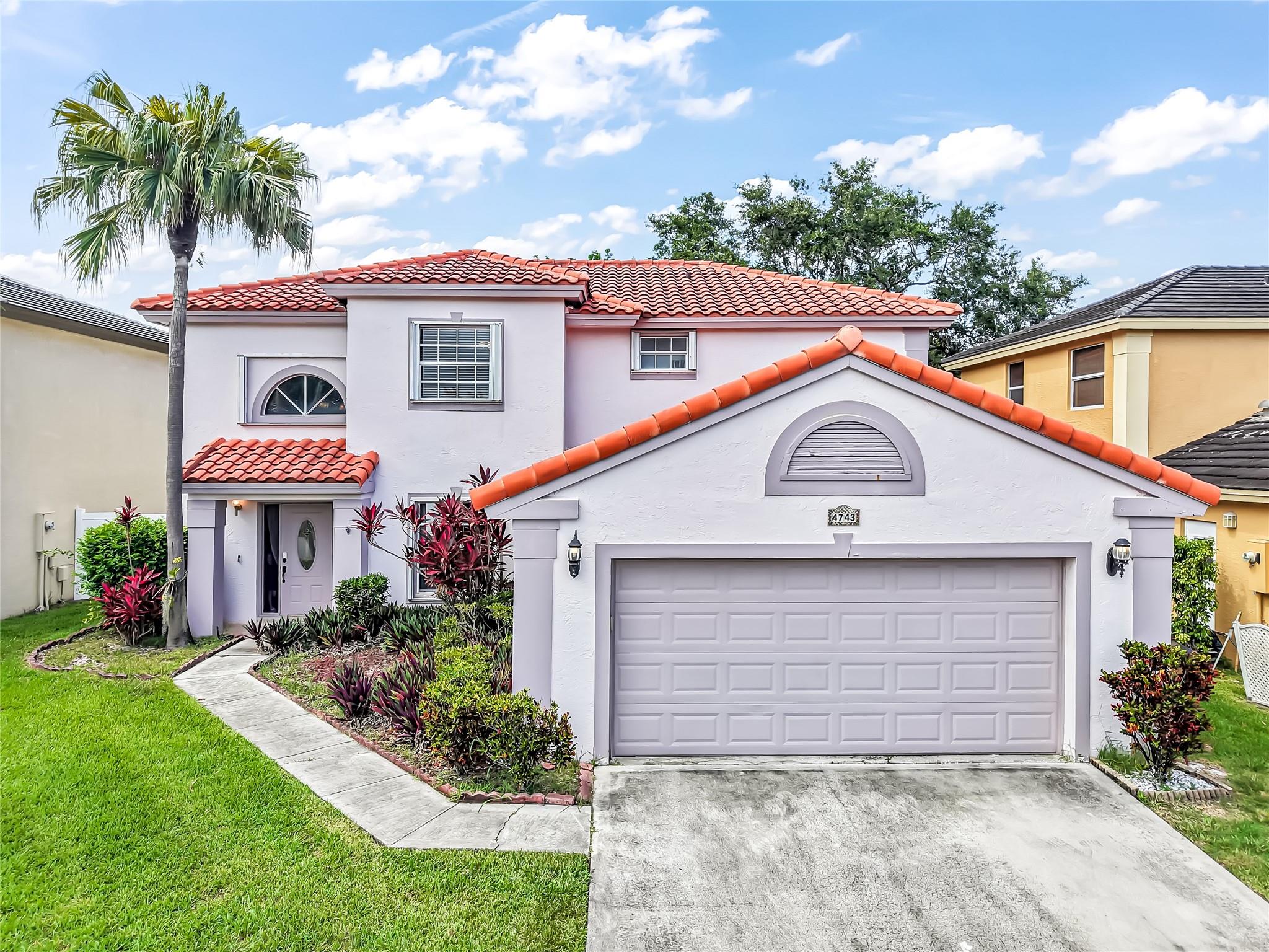 This Amazing 4 bedroom 3 full bath home is waiting for you In the heart of Deerfield beach, this spacious open floorplan home with many updates and renovations is ready to enjoy. Roof has more than half its life left with Accordion shutters for your insurance discounts. A ground floor bedroom and full bathroom for guest or in-laws, Updated kitchen with Real wood cabinets and SS appliances and granite countertops. 3 more bedrooms and 2 bathrooms upstairs. Primary bedroom offers huge walk in California closet with separate vanity and separate soaking tub and shower. Screened in patio with nice size yard for those Summer BBQ's. Full 2 car garage and large driveway. Community Pool and playground make this community a true gem. Close to Highways & resturants & shopping. Fast closing availible.