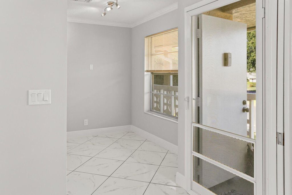 Photo of 2480 Juniper Drive #203, Delray Beach, FL 33445 (MLS # R11149604)