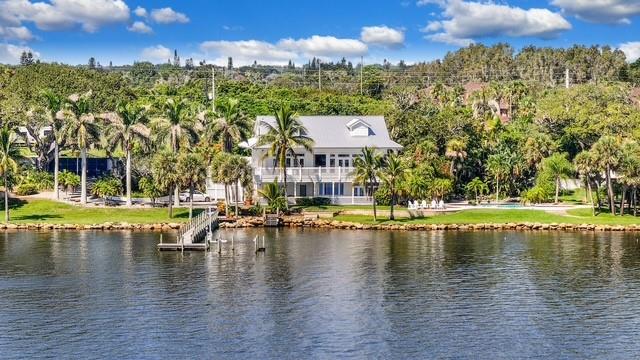 This unique 1.1-acre property features over 420' of direct water frontage, a 10' privacy wall, and excellent proximity to all major Space Coast attractions. Operated as a high-income vacation rental, this turnkey home pays for itself and offers exceptional ROI. Highlights include a metal roof and + rock revetment/seawall (2021), updated appliances (2023) , new pool heater (2024), and a private beach with reinforced seawall.
Bonus: Homeowners insurance is roughly 75% less than beachfront properties.