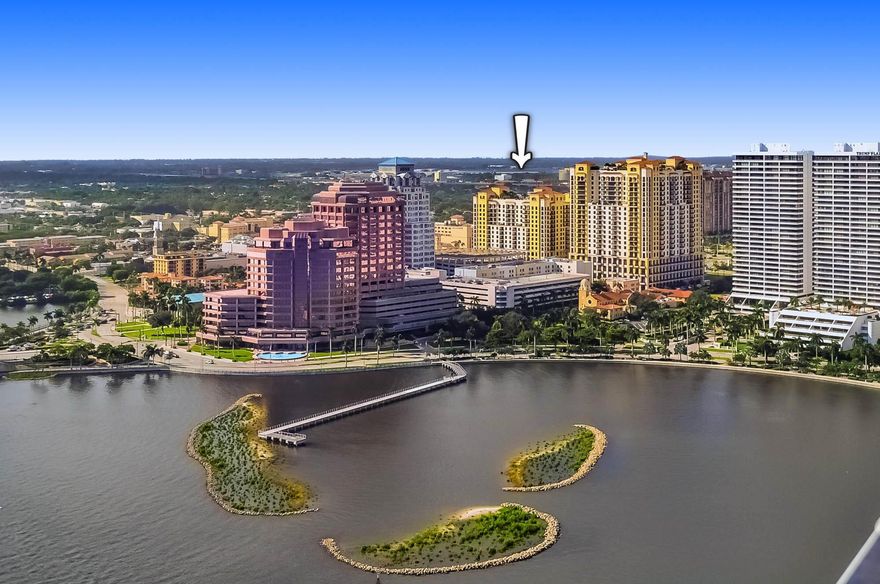 Get situated in the center of Downtown West Palm Beach in this 1,800+ sqft. 2 bed, 3 full bath with an office sun-filled corner unit condo. Bright primary bedroom has 2 large walk-in closets and enormous master bath with soaking tub. Voluminous split bedroom floor plan allows for privacy. Tremendous gym, social room and resort-style roof pool deck that overlooks Palm Beach Island. Masterfully managed with a full staff you'll never feel alone in this comfortable building. Instantly be enticed by the contemporary lobby that welcomes you with 24 hour staffed reception. This spacious bright corner unit has everything you need to feel at home in the middle of all that West Palm Beach has to offer. The immediate area has new Restaurants, Retail and Culture with the recently renovated Kravis Center just a short walk away. Just steps away from the building parking spot. New Bosch AC installed 2020 (3.5 ton).