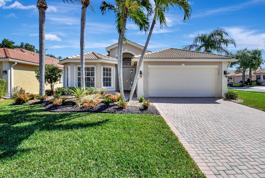 Photo of 7784 Lighthouse Point Lane, Lake Worth, FL 33467 (MLS # R10962056)