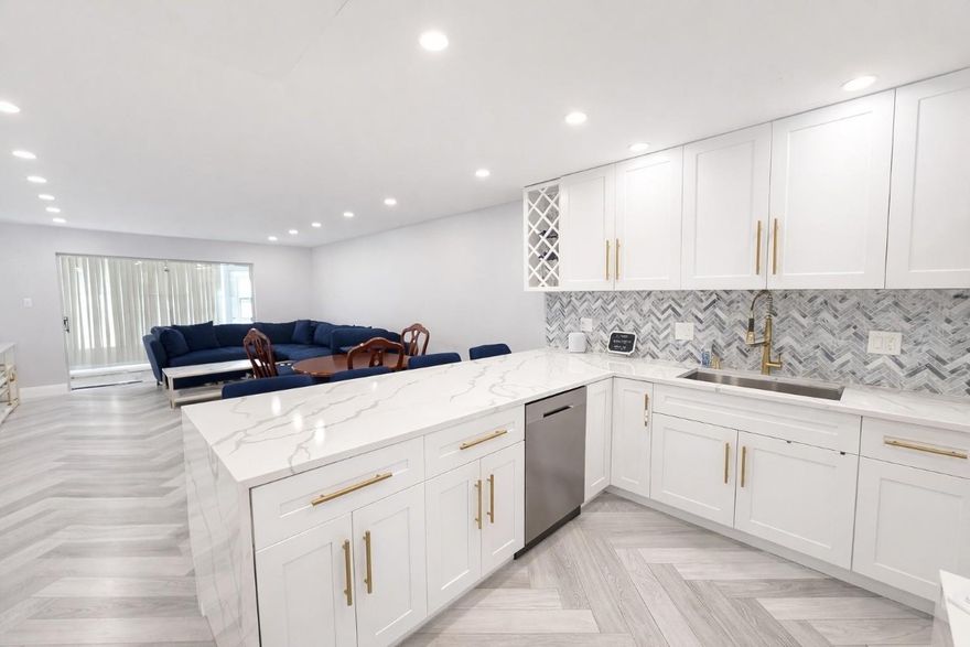 Welcome to modern living at 7300 NW 5th Place #103 in Margate! This newly remodeled condo showcases a bright open layout, a stylish kitchen with modern finishes, and updated bathrooms that balance elegance and functionality. The light-filled living area opens to a private screened balcony—perfect for relaxing or entertaining.Located in a beautifully maintained 55+ community offering amenities such as a pool, clubhouse with a gym, and walking paths, this move-in-ready condo is just steps from the brand-new Publix, close to shopping, dining, and only a short drive to the beach. On-site laundry located two doors to the right, adjacent to mailboxes. Association requires 675+ credit, $35,000+ income, 20–25% down, security deposit, and in-person interview. Priced to sell—don’t miss it!