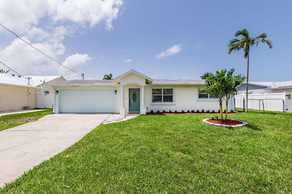 Photo of 1409 SW Seahawk Way Way, Palm City, FL 34990 (MLS # R10818220)