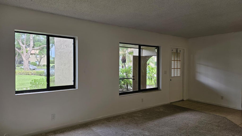 Photo of 520 Shady Pine Way #D1, Greenacres, FL 33415 (MLS # B26080508)