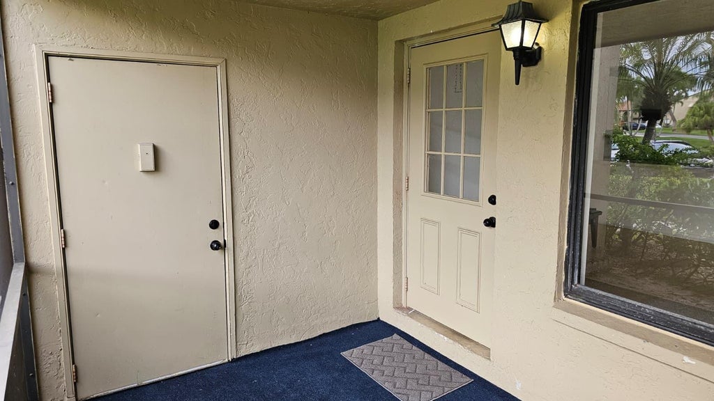 Photo of 520 Shady Pine Way #D1, Greenacres, FL 33415 (MLS # B26080508)