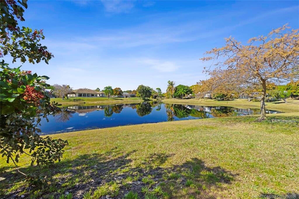 Photo of 3074 NE Loquat Lane, Jensen Beach, FL 34957 (MLS # B26064333)