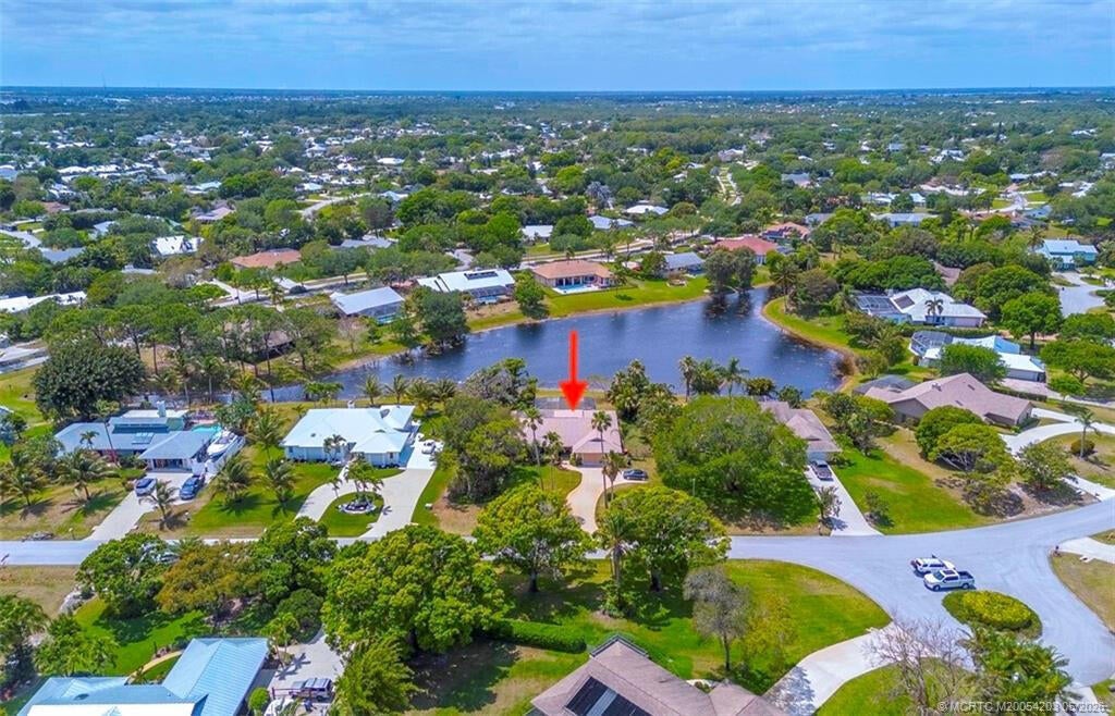 Photo of 3074 NE Loquat Lane, Jensen Beach, FL 34957 (MLS # B26064333)