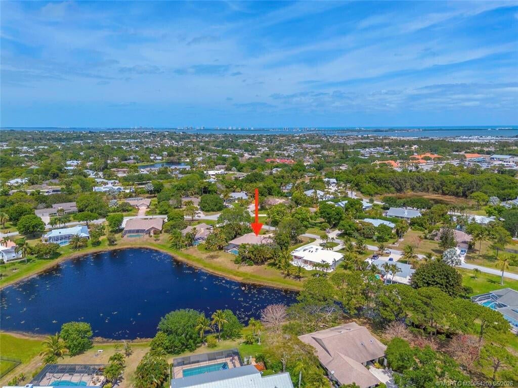 Photo of 3074 NE Loquat Lane, Jensen Beach, FL 34957 (MLS # B26064333)