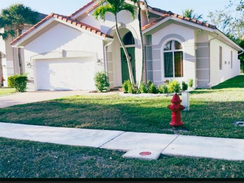 Photo of 9139 Citrus Isle Lane, Lake Worth, FL 33467 (MLS # F10550495)