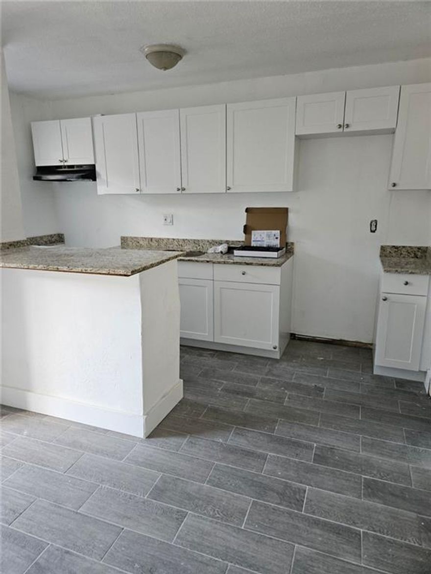 Great East Location! This unit just finished getting completely remodeled! New tile flooring throughout, New kitchen with granite countertops, stainless steel appliances, new bathroom! Only 1 parking spot, tenant must agree to rent paid via automatic withdraw.